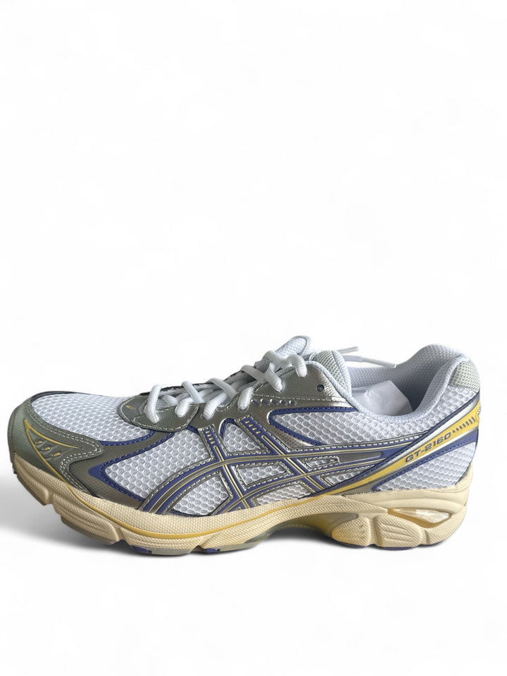 ASICS GT-2160 running shoes in white, blue, and violet colorway showcasing breathable mesh and supportive design.