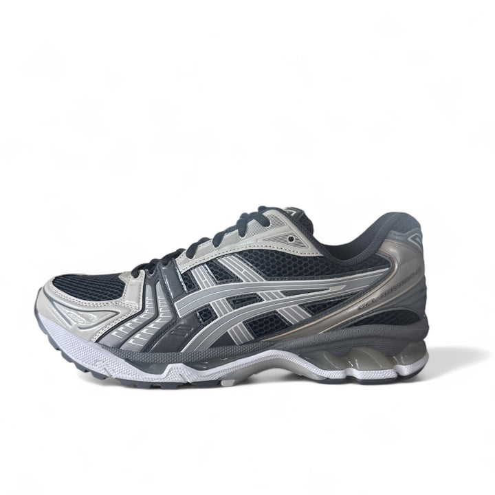 ASICS Gel-Kayano 14 sneakers in Obsidian Grey and Cement colorway, side view showcasing details and design.