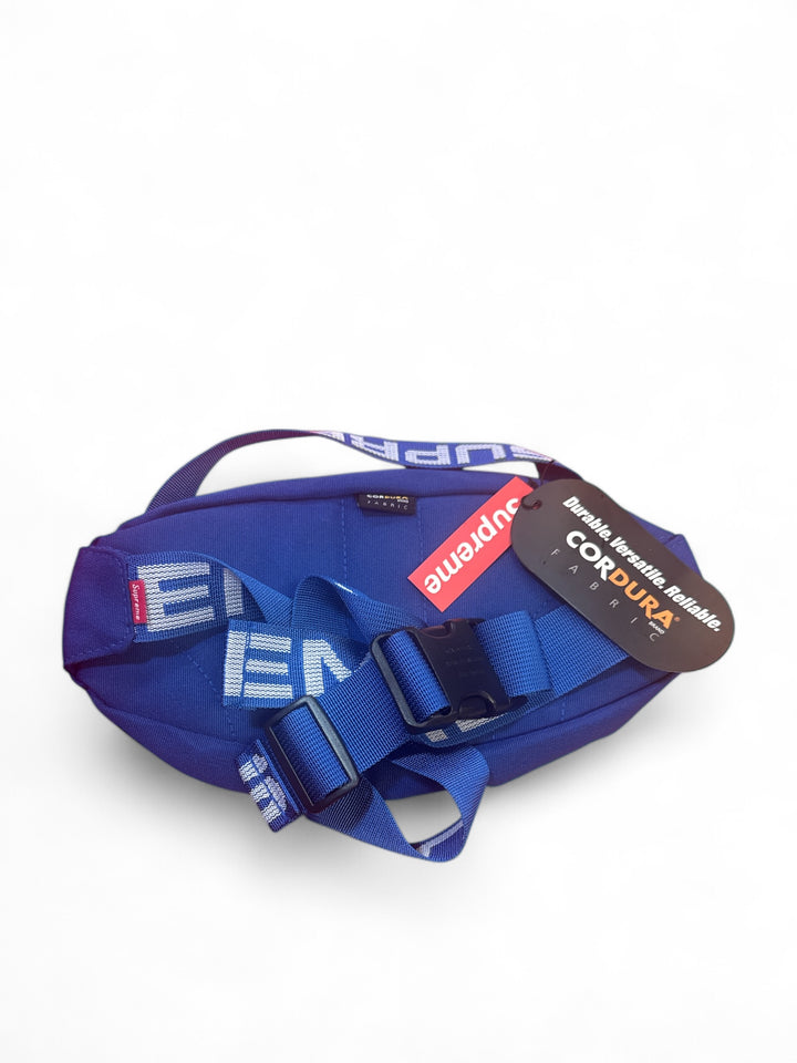 Supreme waist bag SS18 in blue with logo details and adjustable straps.