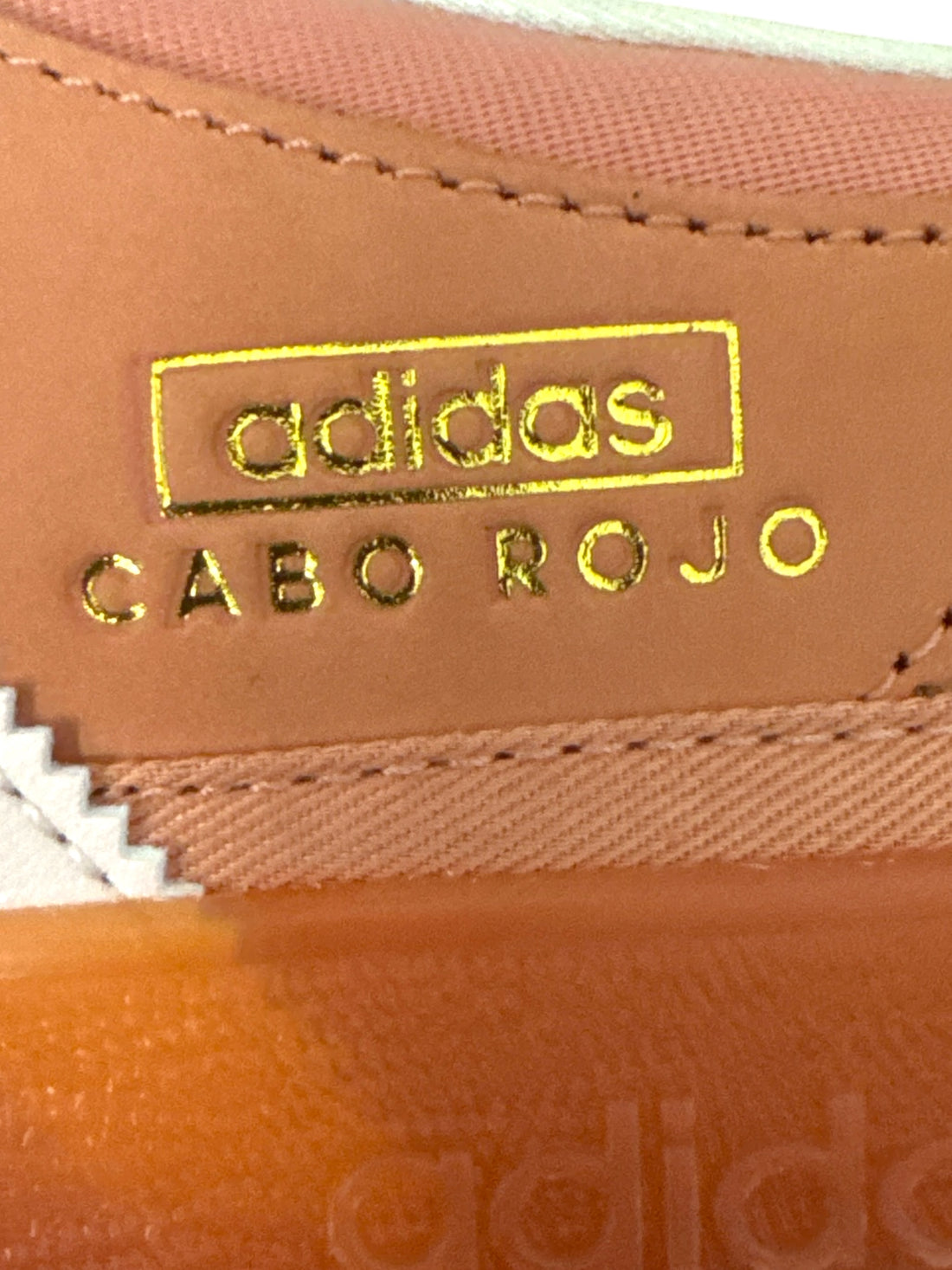 adidas Gazelle Bad Bunny sneakers logo detail in pink and gold