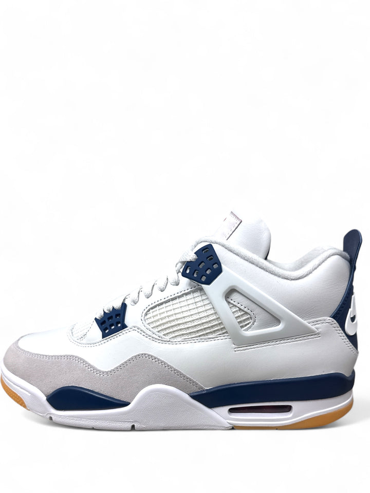 Jordan 4 Retro SB Navy sneakers side view showcasing white and navy colorway with gum sole.