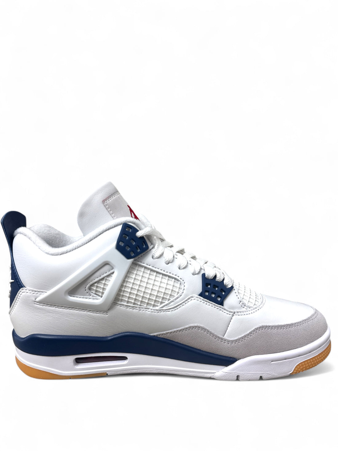 Jordan 4 Retro SB Navy sneakers displayed from the side, featuring white and navy colorway with gum sole.