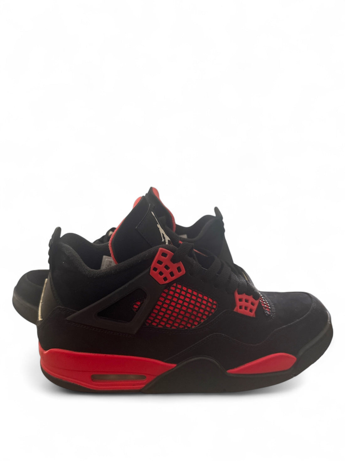 pre-owned Jordan 4 Retro Red Thunder sneaker featuring black and red design, perfect for collectors and sneaker enthusiasts.