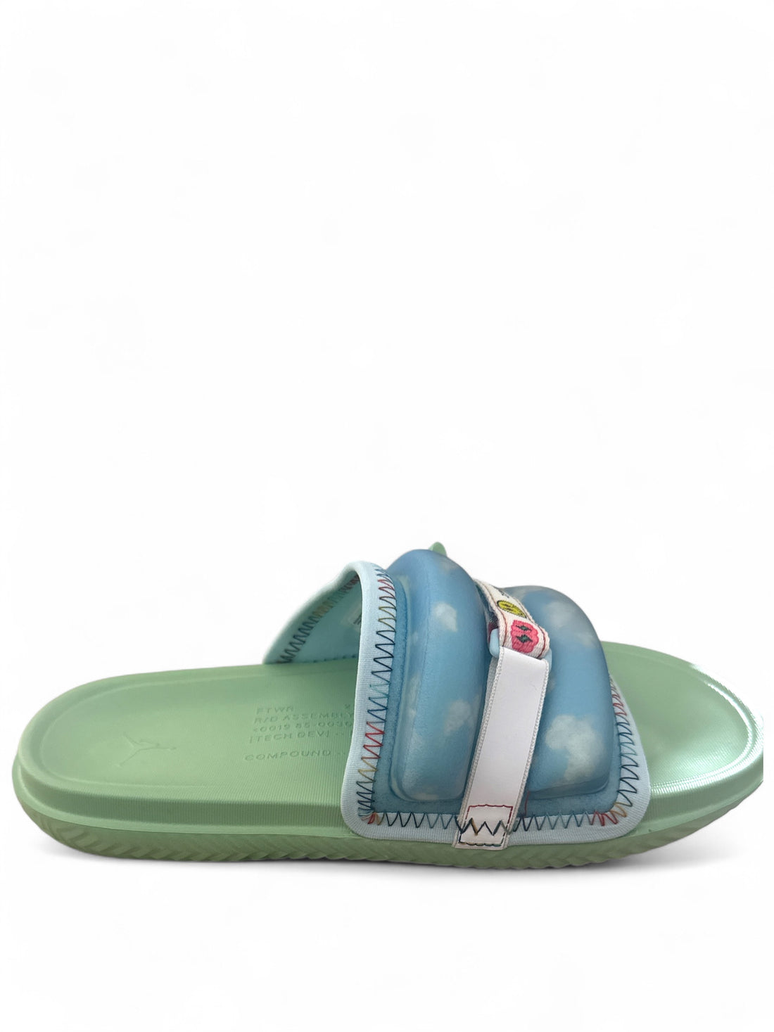 Jordan Super Play Slide J Balvin in blue and green with cloud design for summer style and comfort.