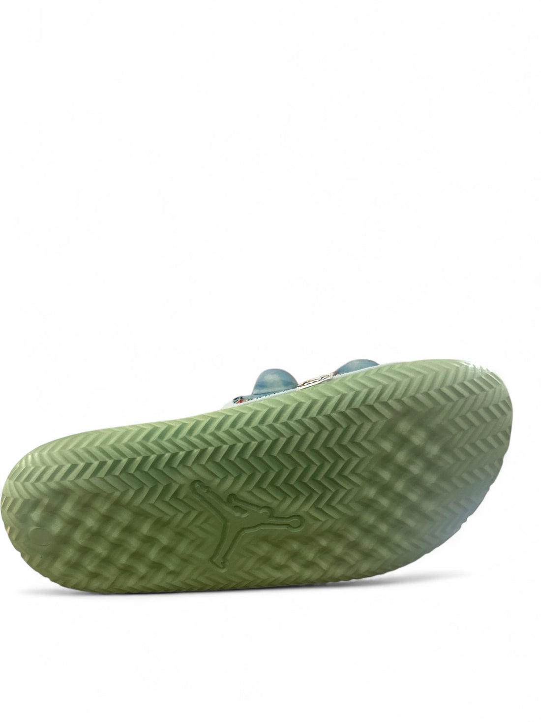 Bottom view of the Jordan Super Play Slide J Balvin showcasing its unique sole design and vibrant colors.
