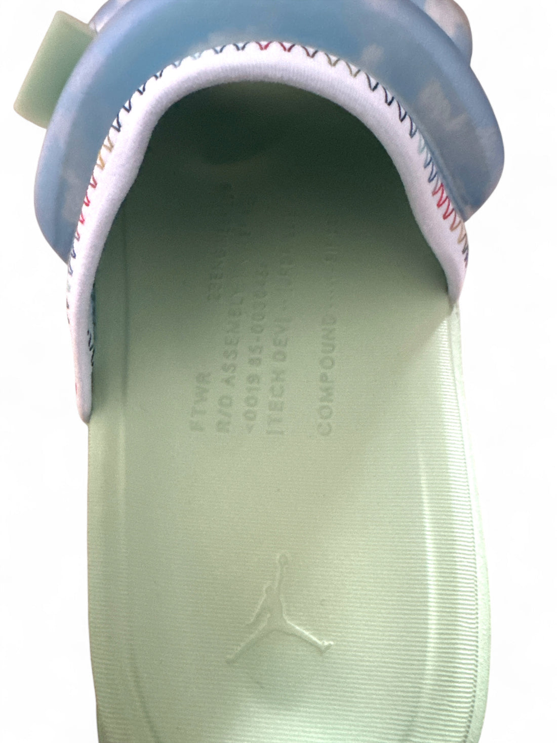 Jordan Super Play Slide J Balvin top view with green sole and stylish strap design.