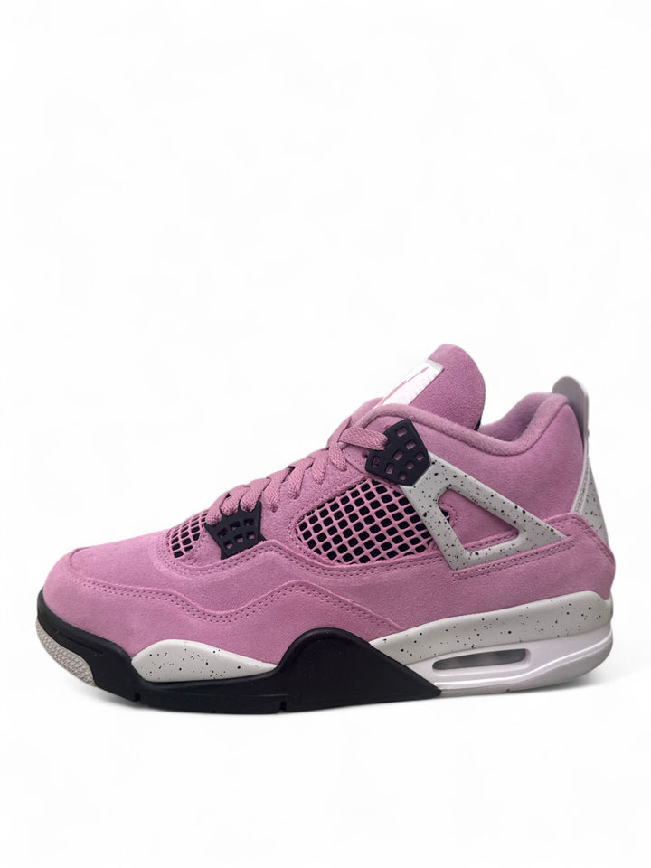 Jordan 4 Retro Orchid sneaker featuring a stylish orchid colorway and premium materials.