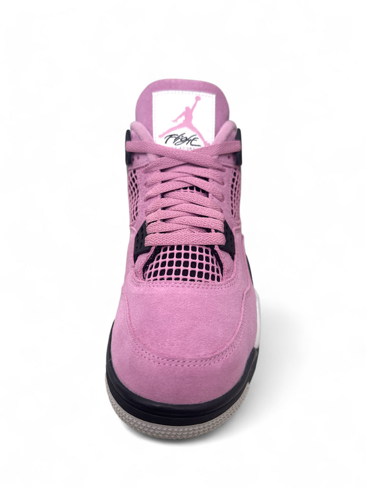 Jordan 4 Retro Orchid stylish sneaker featuring a pink colorway and classic Jordan logo on the tongue.