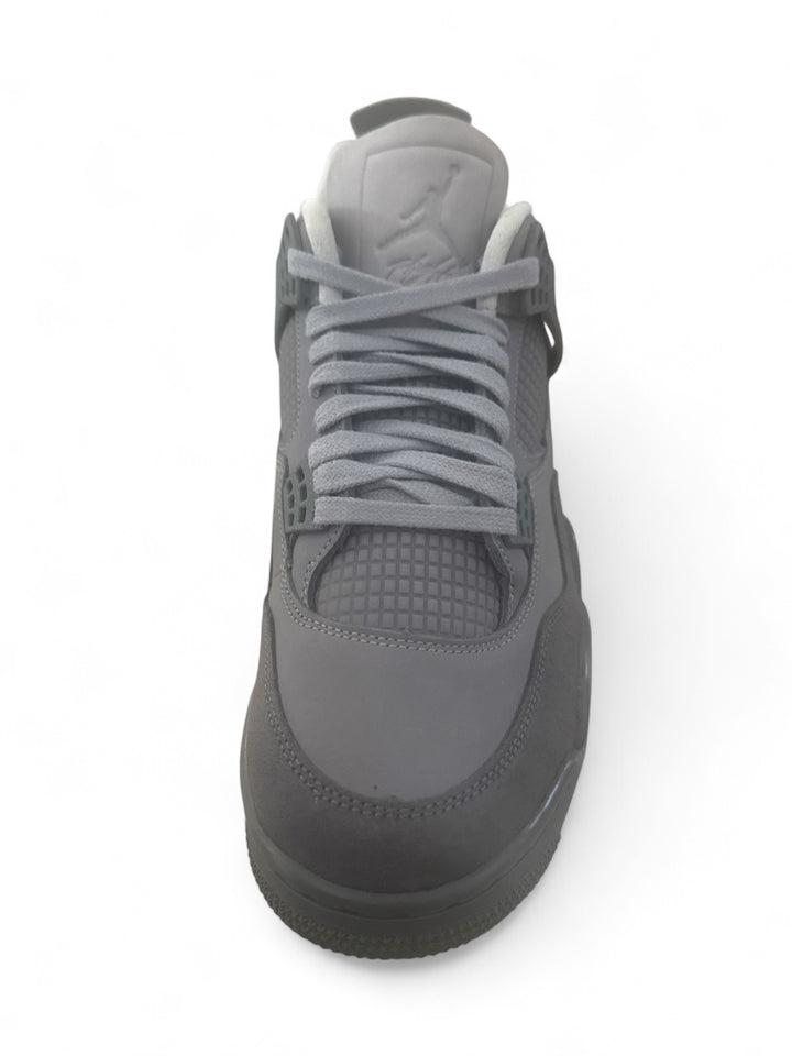Jordan 4 Retro SE Paris Olympics top view showing smooth leather and mesh design in gray color.
