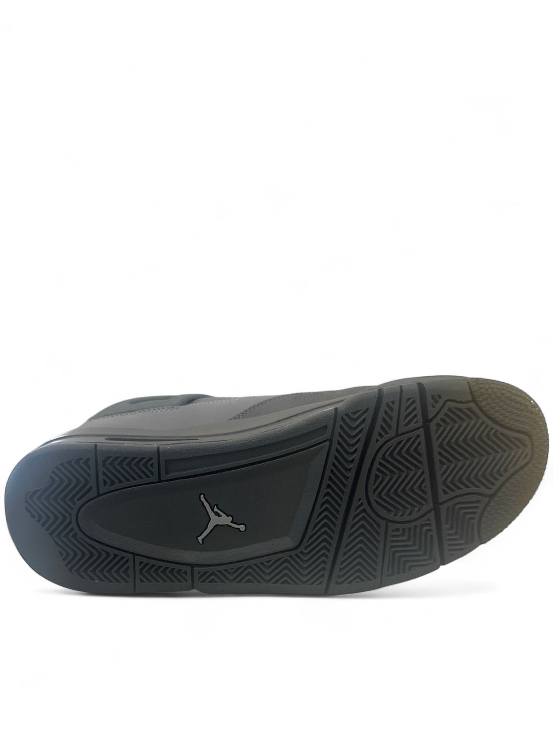 Sole of Jordan 4 Retro SE Paris Olympics sneaker showcasing the unique tread and branding.