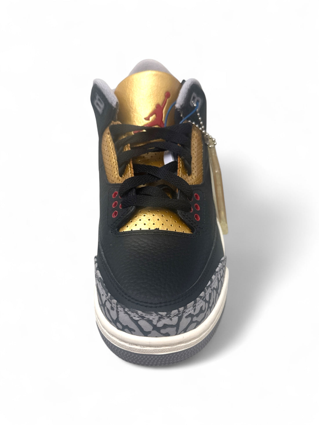 Jordan 3 Retro Black Cement Gold sneaker featuring black upper, gold accents, and elephant print overlays.