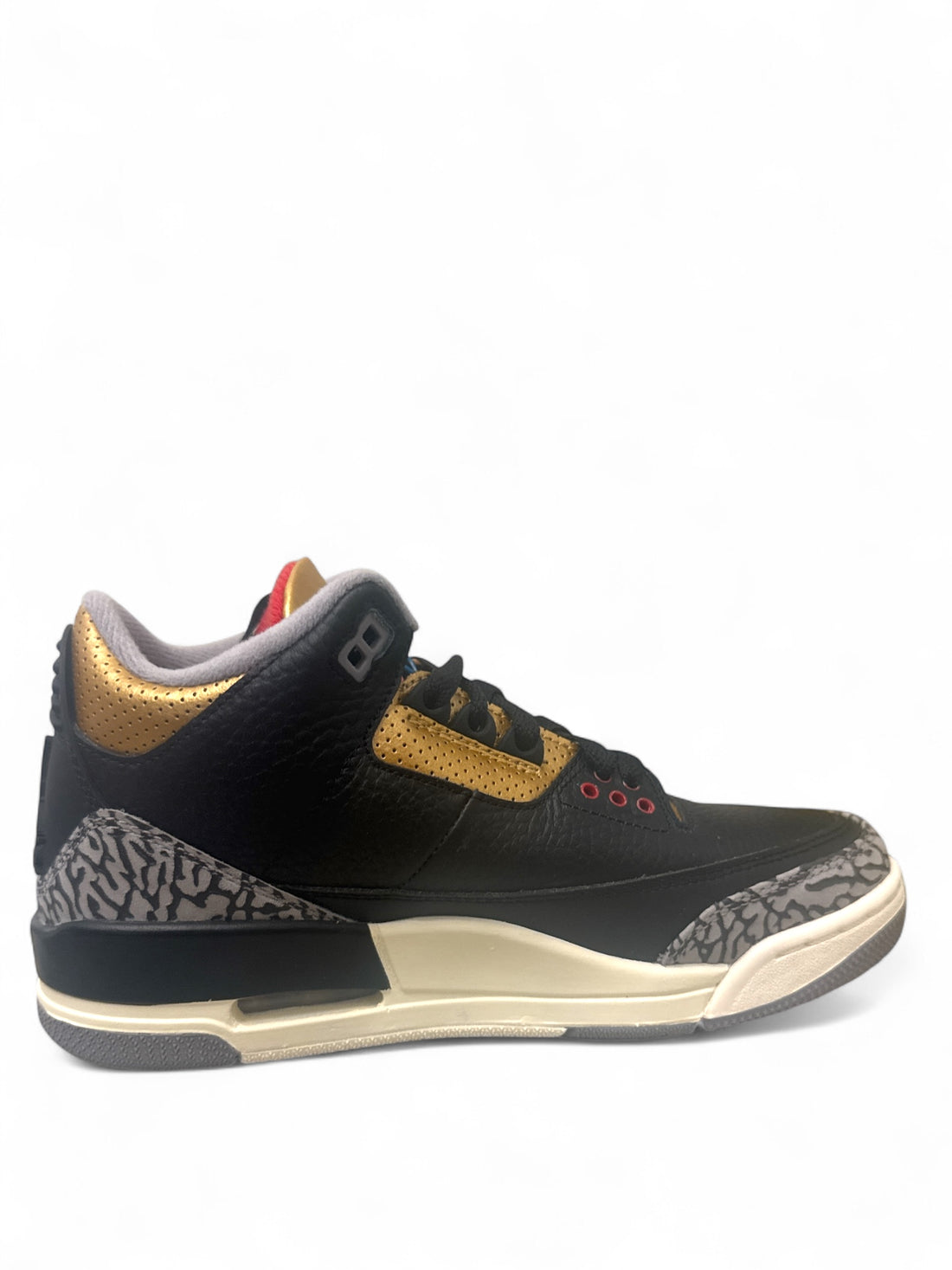 Jordan 3 Retro Black Cement Gold sneaker showcasing black upper with gold accents and elephant print design.