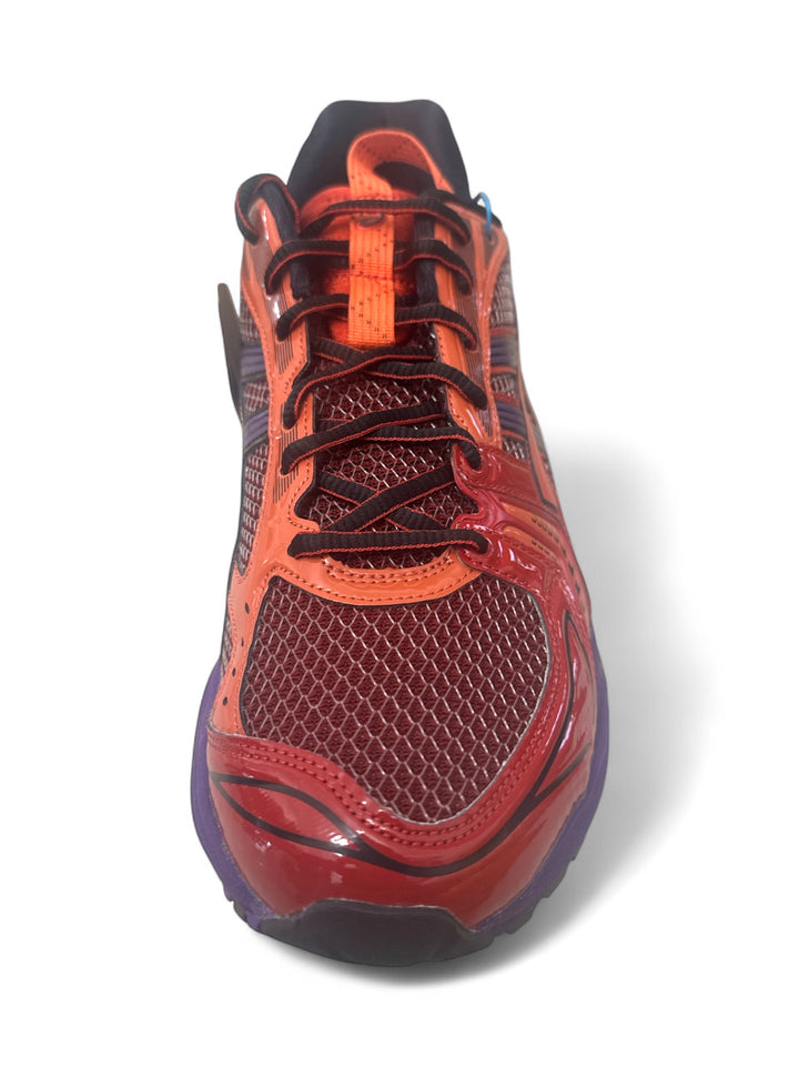 ASICS Gel-Kayano 14 Classic Red running shoes in bold red and orange design from the front view.