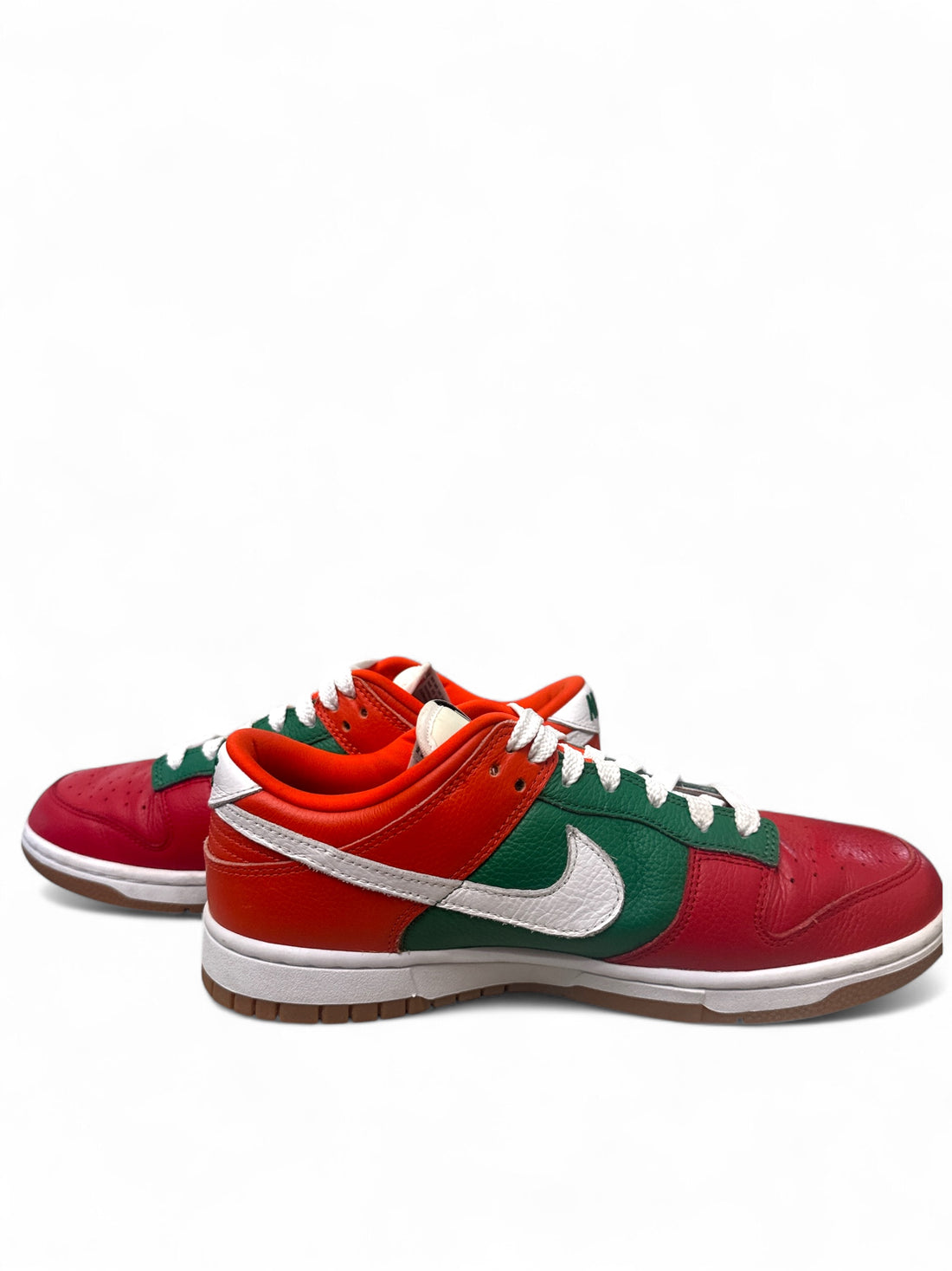 Nike Dunk Low 7-Eleven custom sneakers featuring vibrant red and green colors with white accents.
