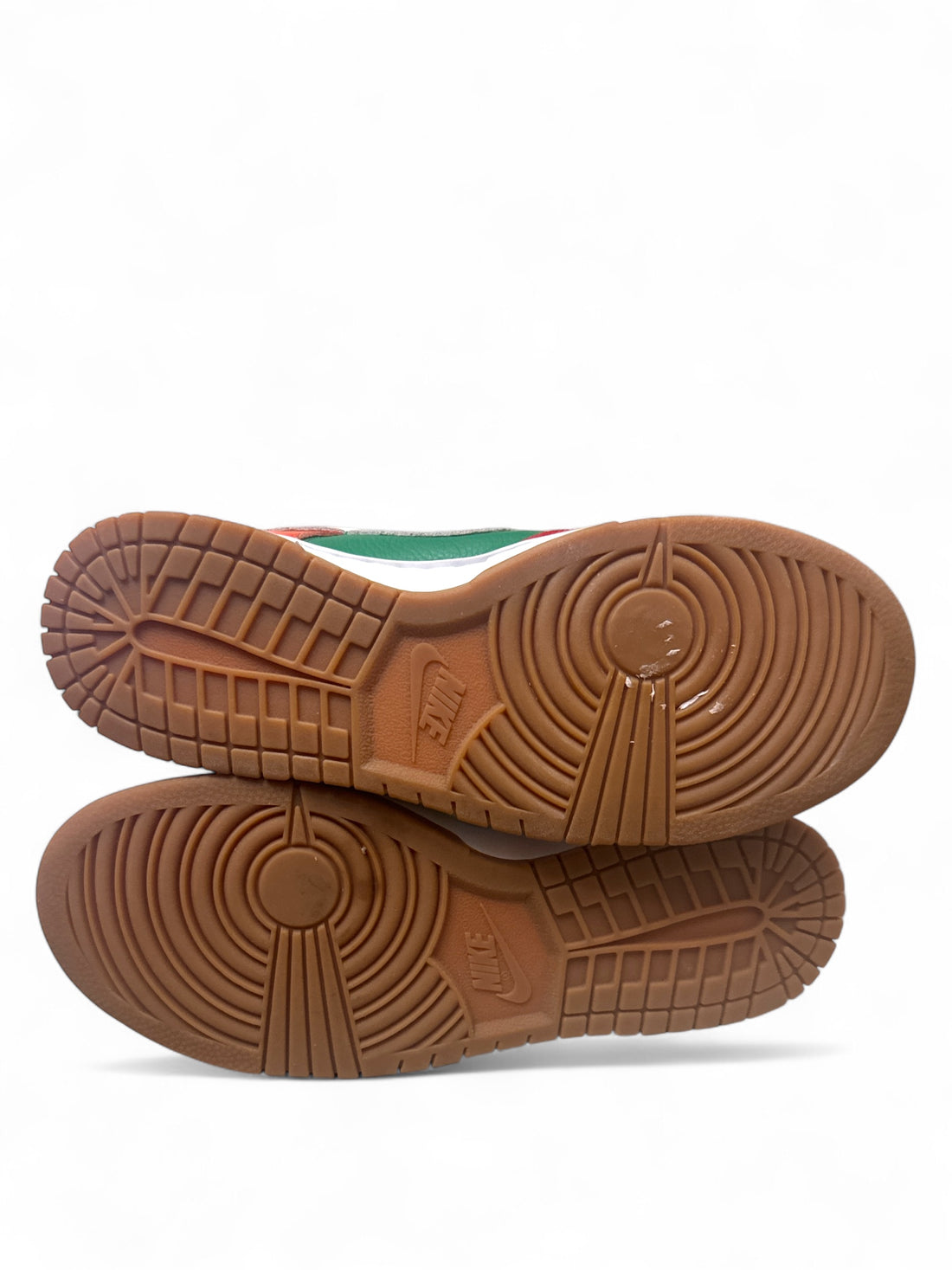Nike Dunk Low 7-Eleven custom sneakers sole view, featuring a distinctive gum outsole.