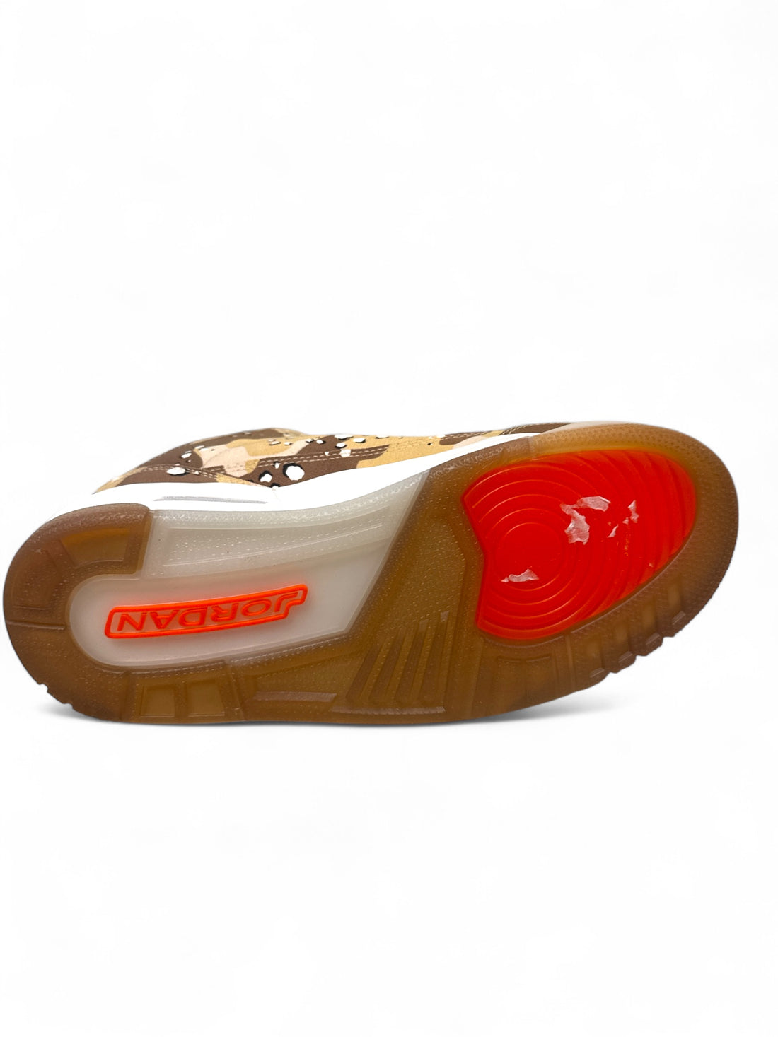 Jordan 3 Retro WNBA Desert Camo shoes showing the unique sole design and color patterns.