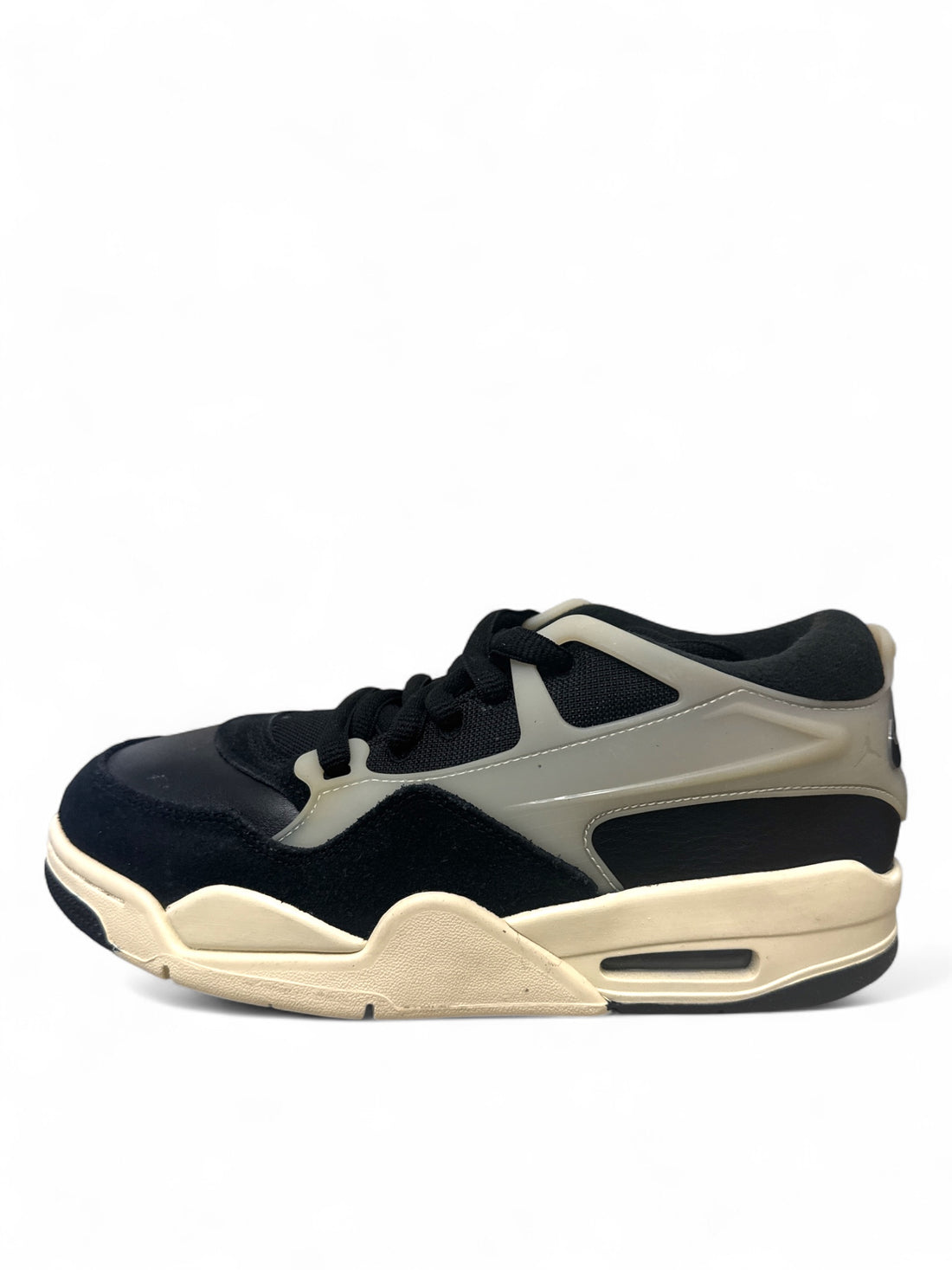 Jordan 4 Black Sail GS sneakers side view showcasing sleek design and colorway.