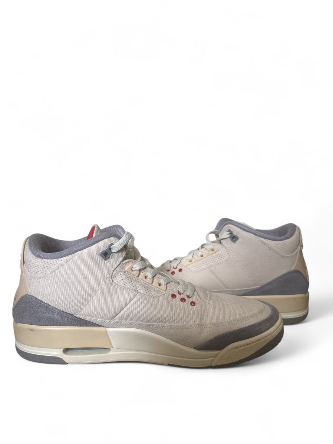 pre-owned Jordan 3 Retro Muslin sneakers displayed from the side on a white background.