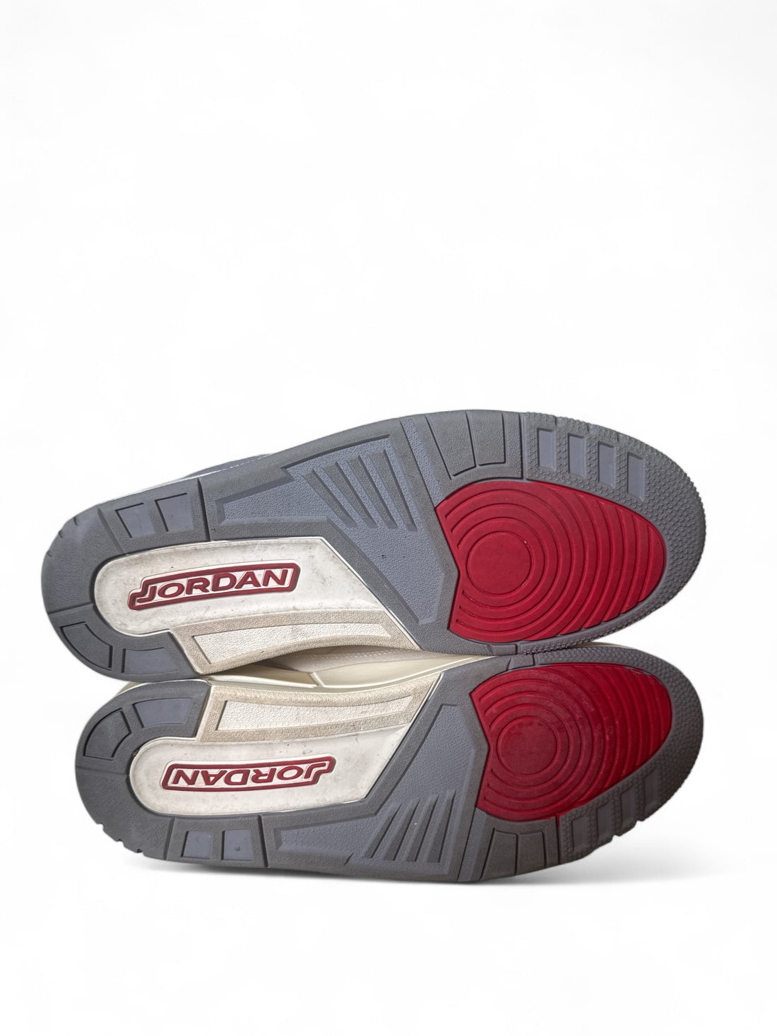 pre-owned Jordan 3 Retro Muslin sneakers showing the sole design and color details.