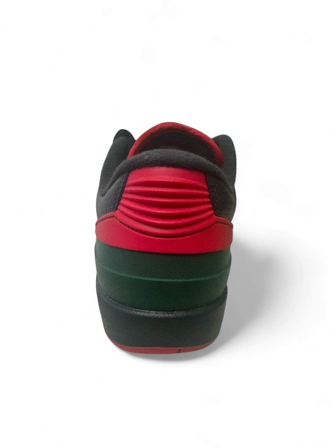 Back view of Jordan 2 Retro Low Christmas sneakers featuring festive red and green accents.