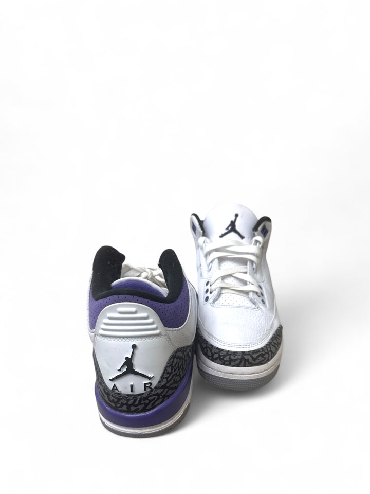 Back view of Jordan 3 Retro Dark Iris 6.5Y sneakers showcasing unique purple and black details.
