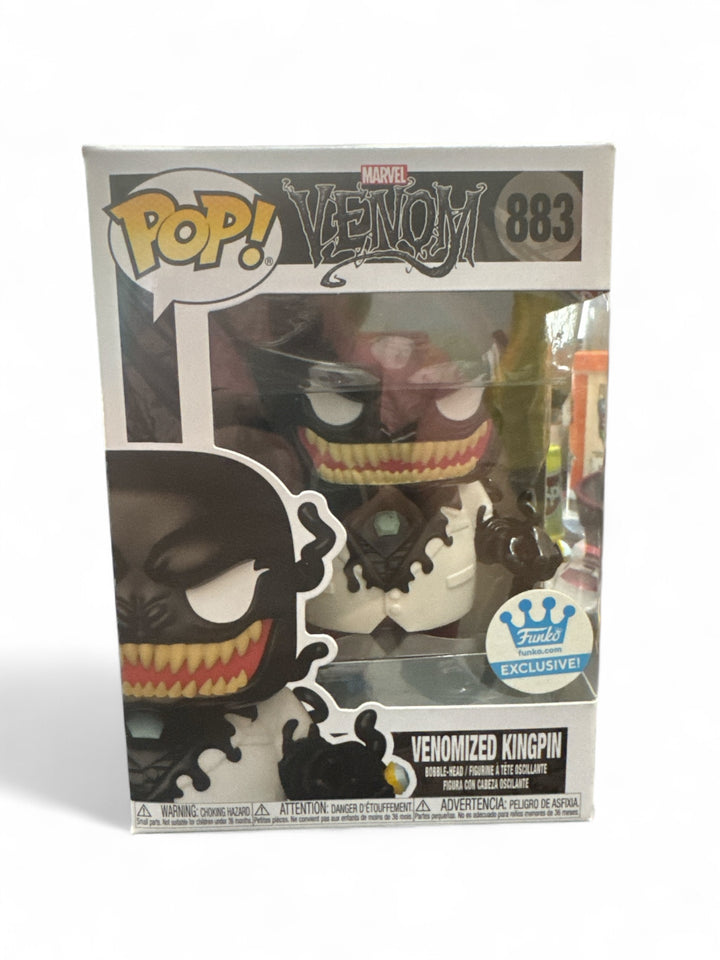 Venomized Kingpin Funko POP displayed in box, featuring Venom's design with sharp teeth and exclusive label.