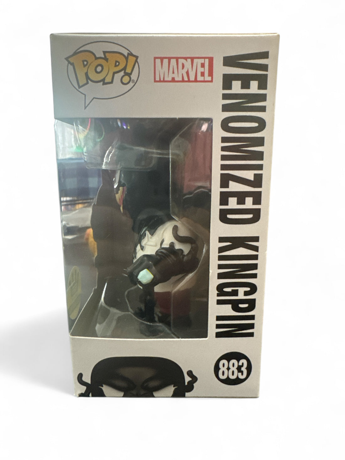 Venomized Kingpin Funko POP figure in original box showcasing Marvel collectible design.