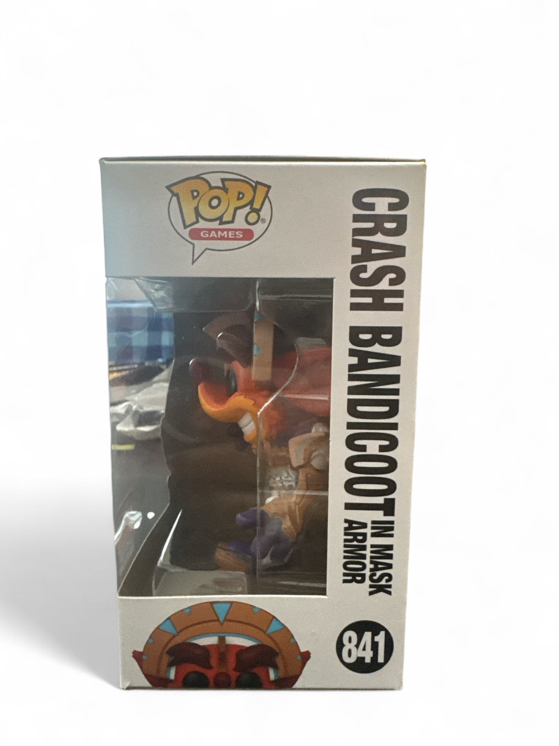 limited edition Crash Bandicoot Funko Pop in box featuring mask armor and vibrant colors.