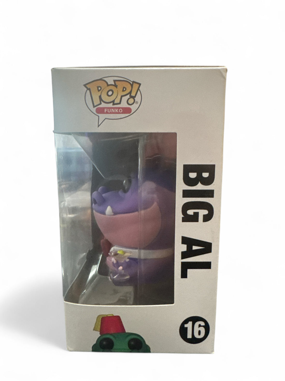 Big Al Funko Pop exclusive collectible figure in its box, showcasing detailed design and unique features.