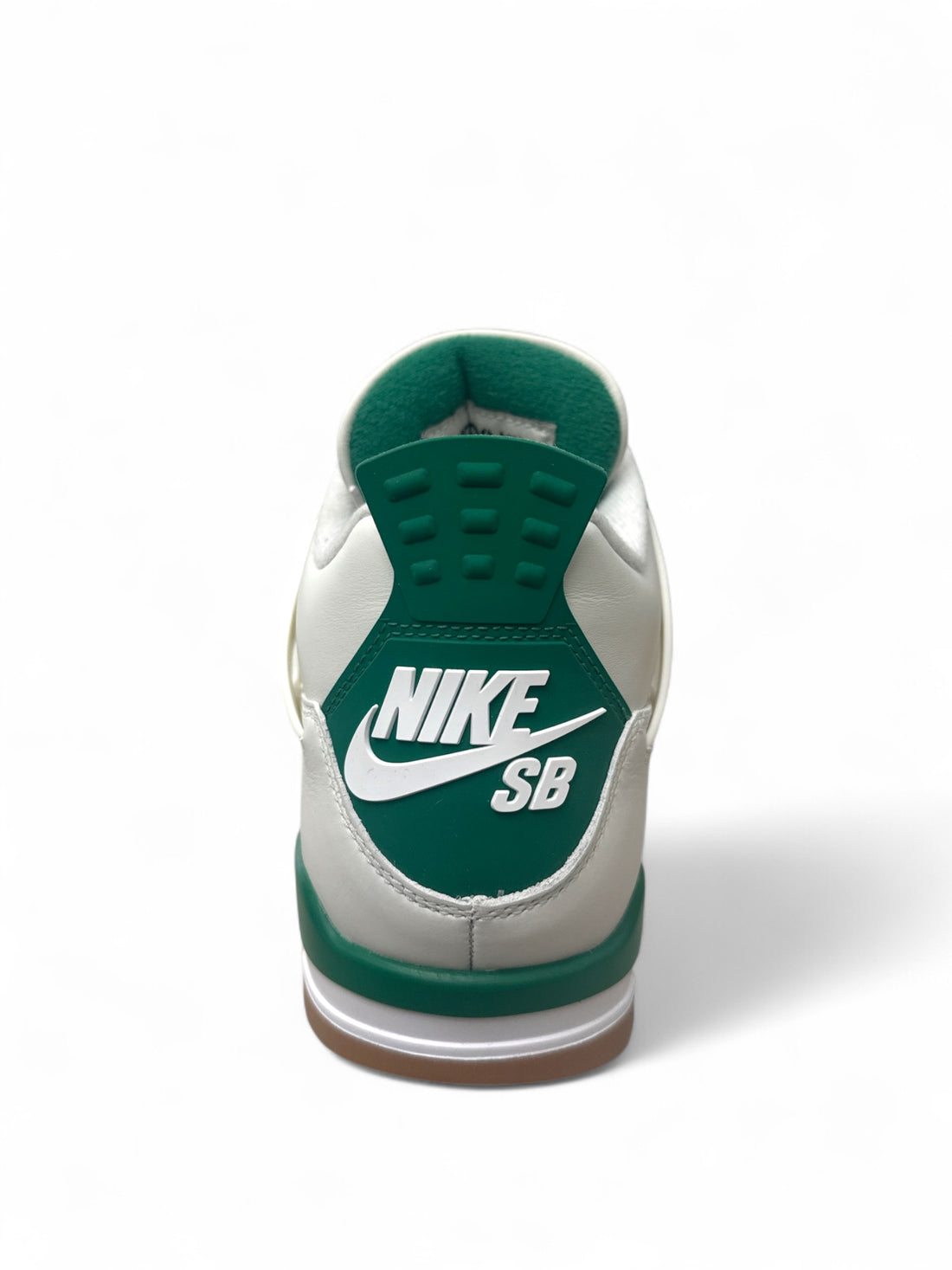 Jordan 4 Retro SB Pine Green heel view featuring white leather and Pine Green accents.