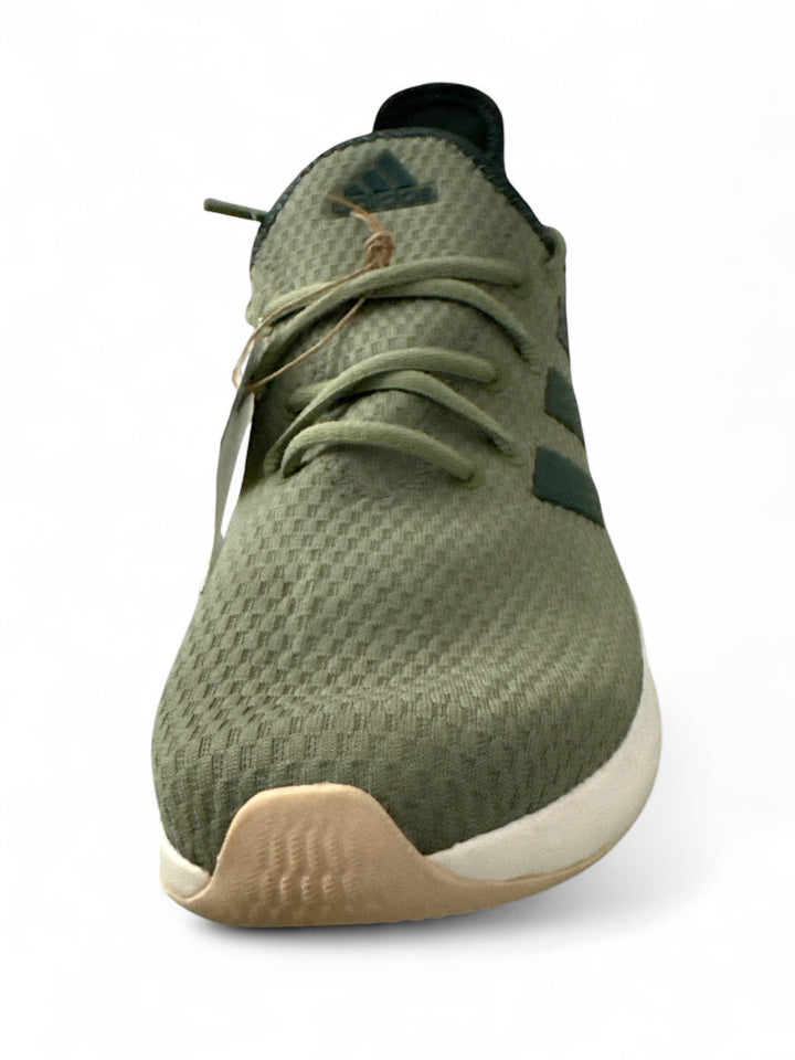 adidas Cloudfoam Pure women sneakers in green color with textured upper and cushioned sole for comfort.